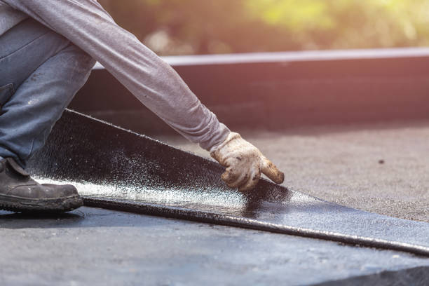 Professional Basement Waterproofing technician working in Millwood, VA